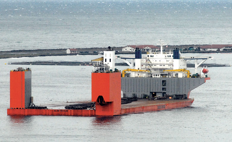 The transport ship Blue Marlin anchors in Port Angeles Harbor on Saturday. In the background is U.S. Coast Guard Air Station/Sector Field Office Port Angeles on Ediz Hook. — Keith Thorpe/Peninsula Daily News