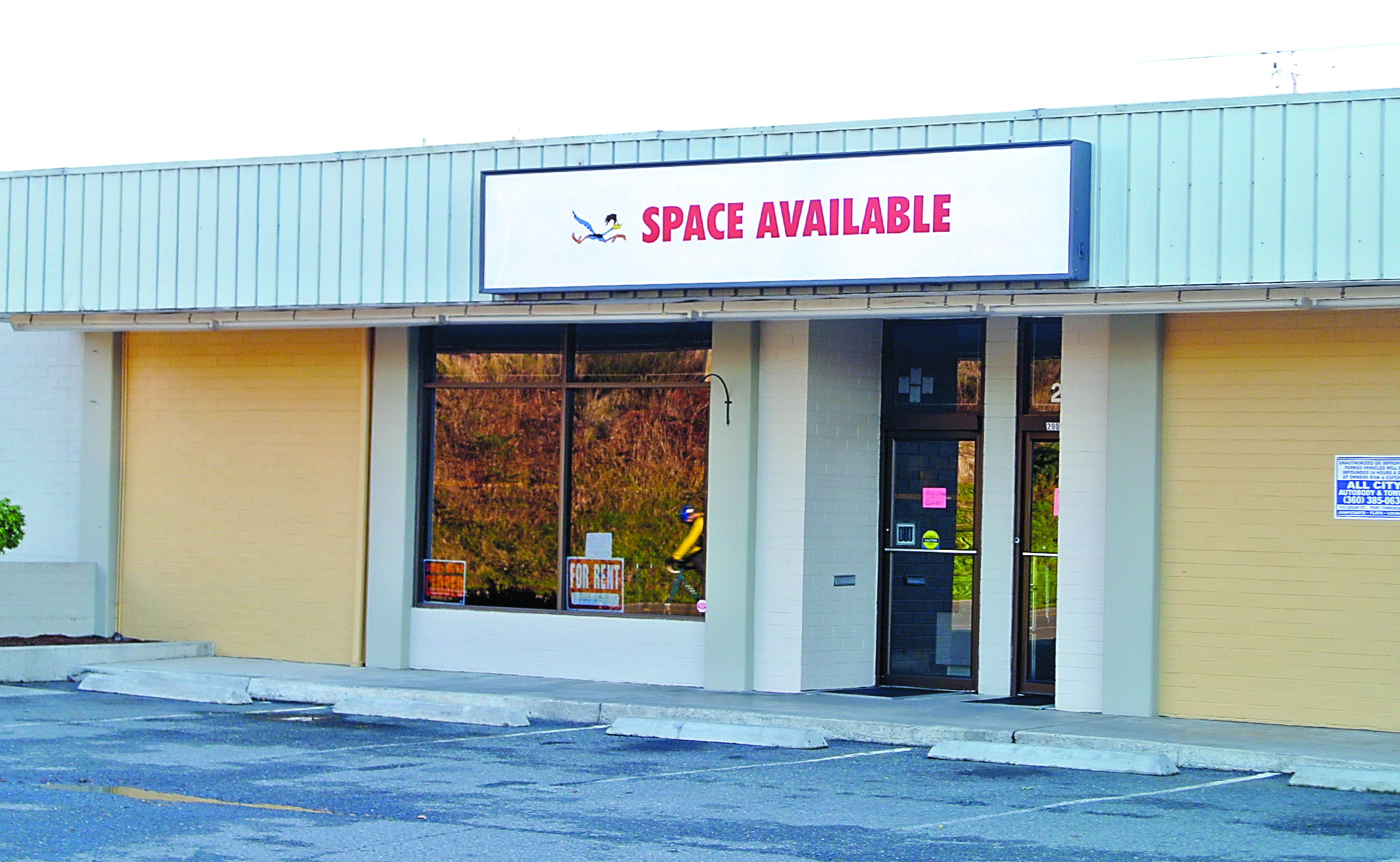 The space that once housed Port Townsends state liquor store at 2005 E. Sims Way now looks for a refill.  -- Photo by Charlie Bermant/Peninsula Daily News
