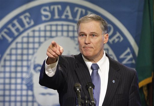 Gov. Jay Inslee holds a news conference in Olympia to introduce is 2015-17 budget proposal.  —Photo by The Associated Press