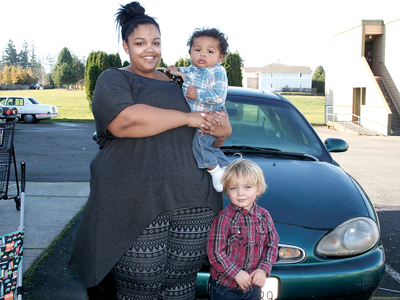 Single mother J'Dai Bowers — holding newborn Hayden