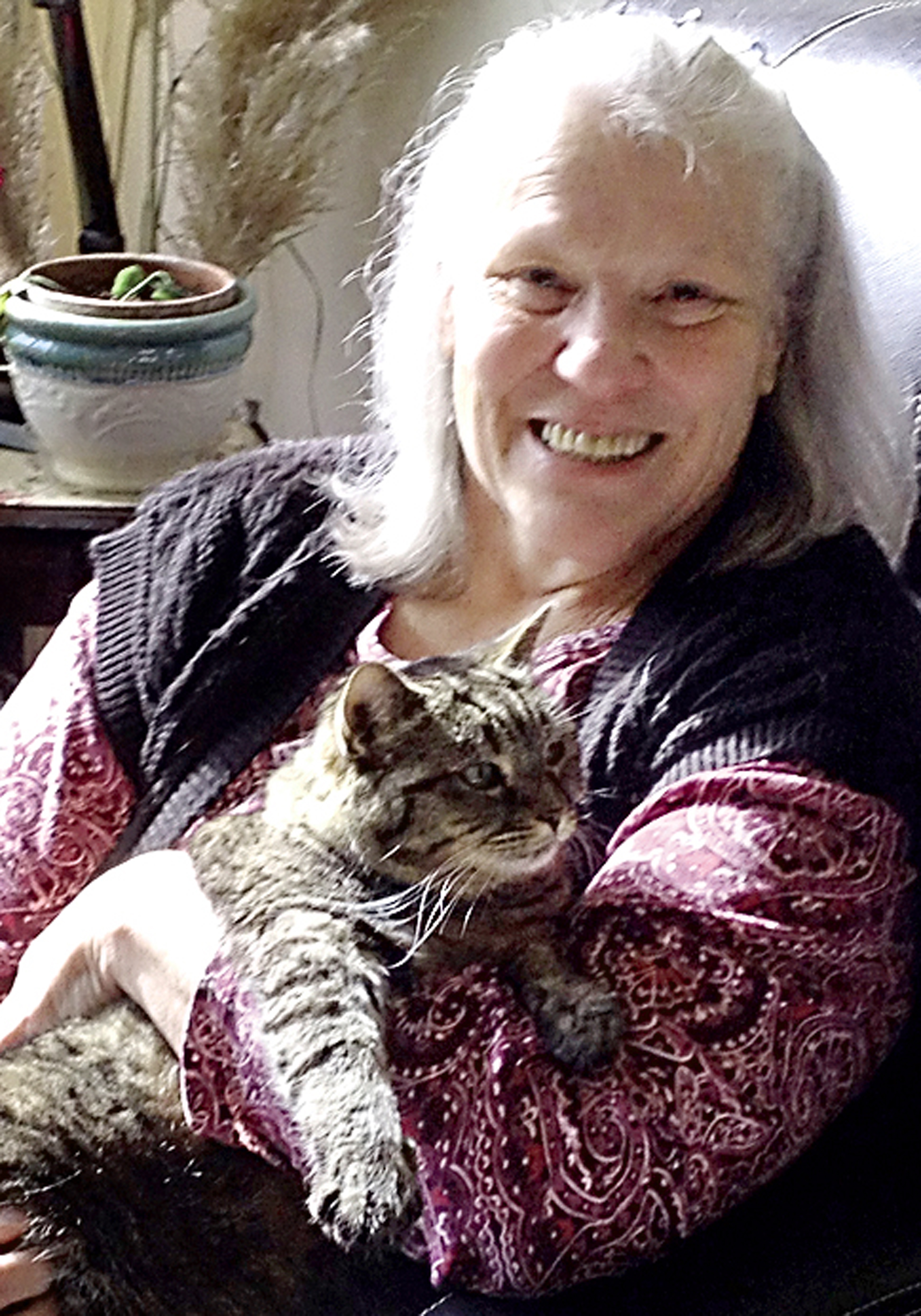Patricia Gillian holds her cat