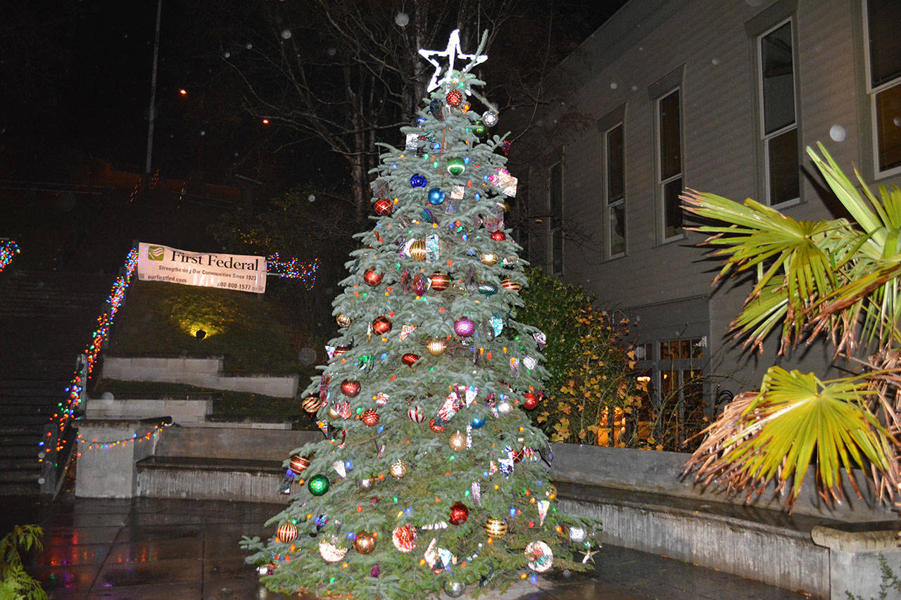 The tree at Haller Fountain in Port Townsend was officially lit Saturday. (Mark Krulish/for Peninsula Daily News)