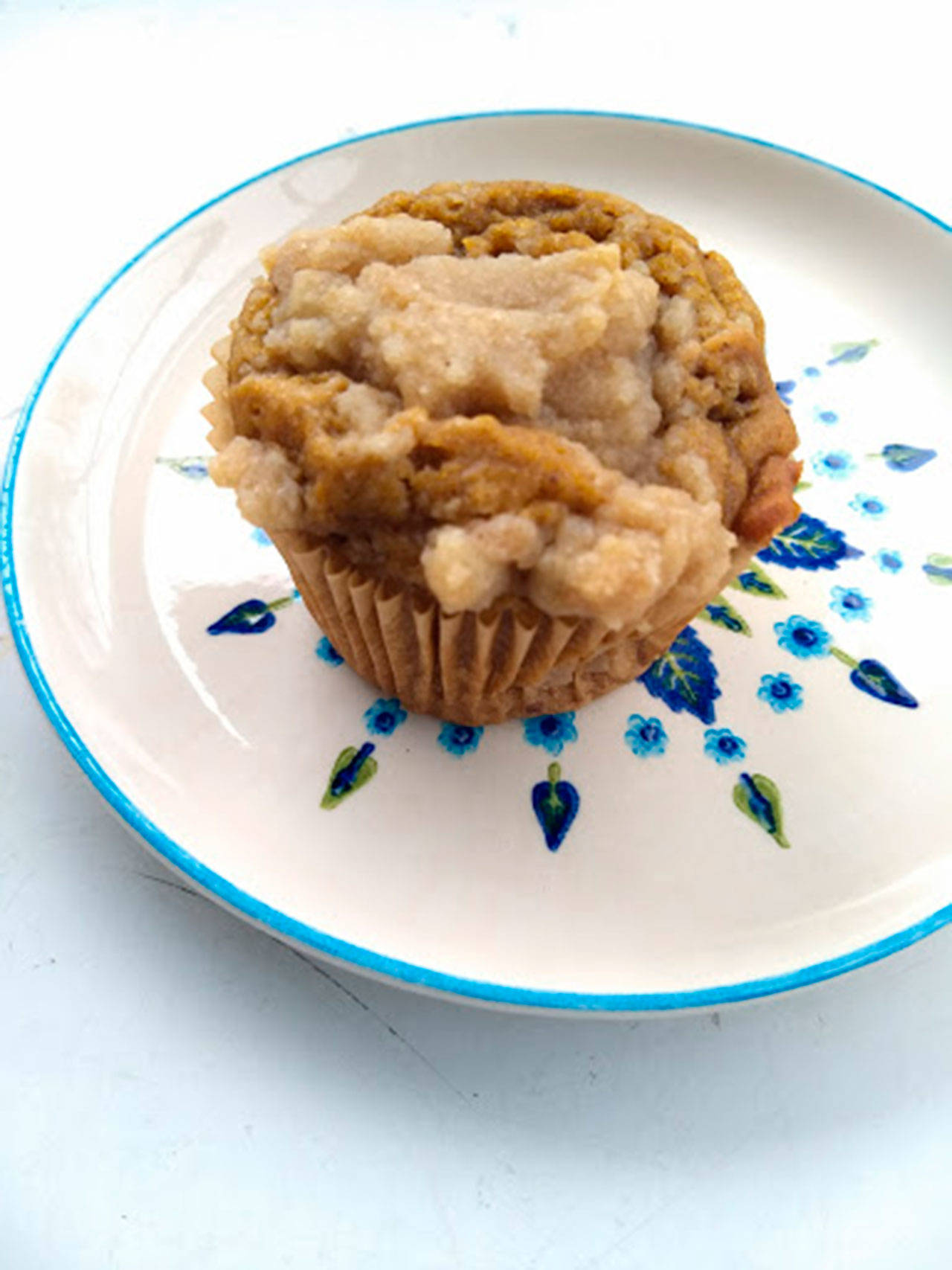 A pumpkin crumb muffin sits ready for eating. (Carrie Sanford/for Peninsula Daily News)