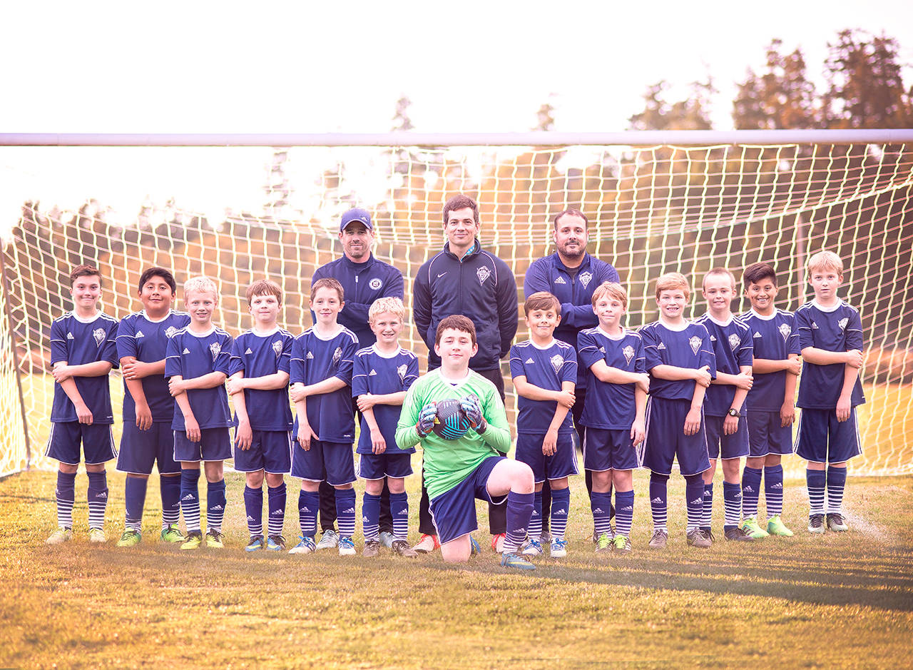 Sweet Smile Creations The Storm King Shockers claimed the North Puget Sound League Boys U-11 Division II title Sunday at Albert Haller Fields in Sequim. Team members are, front row, from left, Max Lee, Adrian Mendez, Matthew Miller, Jude Wallace, Kyhlan Henderson, Conner Goff, Nic Jagger, Nico Musso, James Mason, Gus Halberg, Grant Butterworth, Memo Salgado and Jacob Olsen. Back row, coaches Dave Henderson, Michael Miller and Santiago Musso.