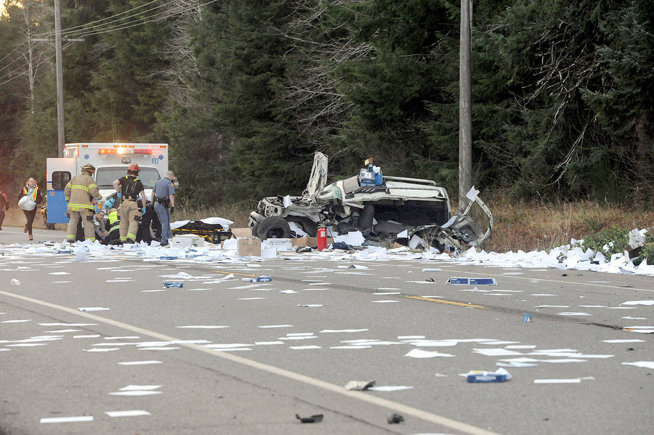 A Port Angeles man was injured Friday afternoon when his Nissan Xterra hit a tractor-trailer on U.S. Highway 101 near Forks. (Lonnie Archibald/for Peninsula Daily News)