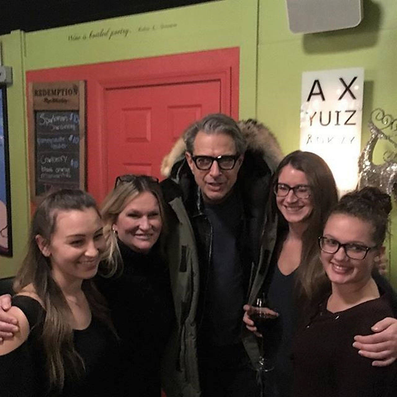 Amanda Florea, Kim McDougal, Carly Swingle and Devon Santiago pose for a photo with actor Jeff Goldblum on Dec. 5 in Blondie’s Plate. Goldblum was in the area filming scenes for the new movie “The Mountain.” (Darren Stephens)