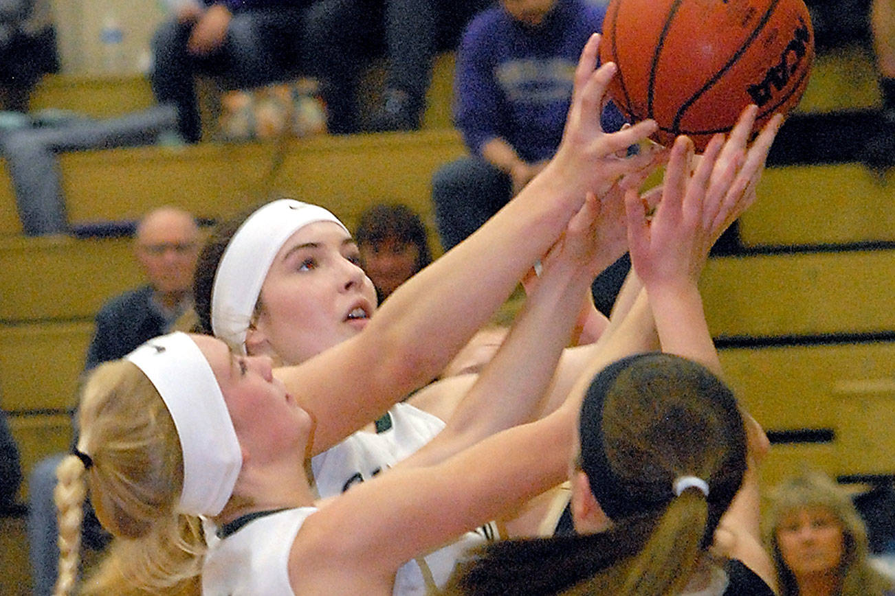 GIRLS BASKETBALL: Port Angeles pitches rare first-half shutout in rivalry win