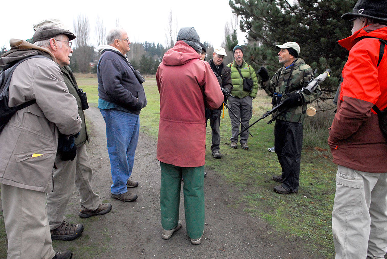 Ron Sykes, right, explains the process and schedule to counters during the Annual Christmas Bird Count at Kai Tai Lagoon in Port Townsend on Saturday. (Jeannie McMacken/for Peninsula Daily News)