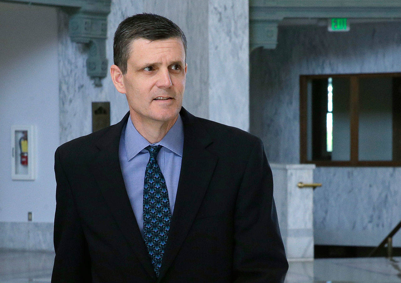 In this April 26, 2016, file photo, Washington state Auditor Troy Kelley leaves the federal courthouse in Tacoma. (The Associated Press)