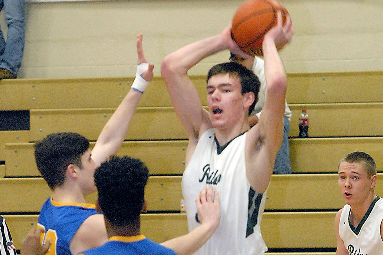 BOYS BASKETBALL: Roughriders respond on defense, limit Rochester to 7 points in second half