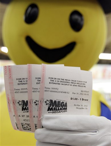 Mega Millions lottery tickets that were given away to 540 people in an Indiana promotion are displayed by the Hoosier Lottery's Mega Millions mascot at a store in Zionsville