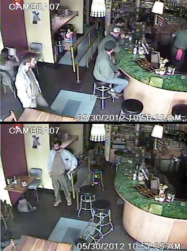 Seattle police say the suspect in two shootings that killed 4 people is shown here in security footage inside Cafe Racer. The timestamps in the security images show an elapsed time of slightly more than a minute. Seattle Police Department