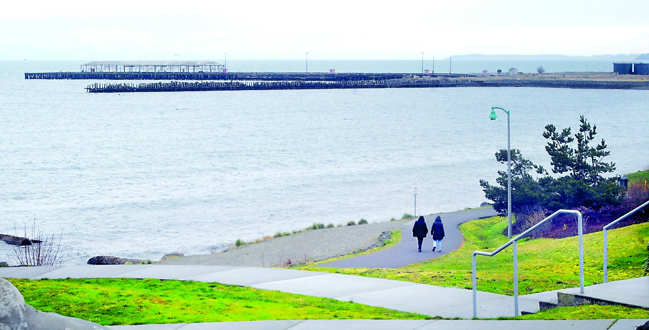 Pedestrians on the Waterfront Trail near Francis Street Park approach the site of the former Rayonier pulp mill in Port Angeles. Keith Thorpe/Peninsula Daily News