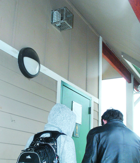 Sequim youths hang out under the loudspeaker