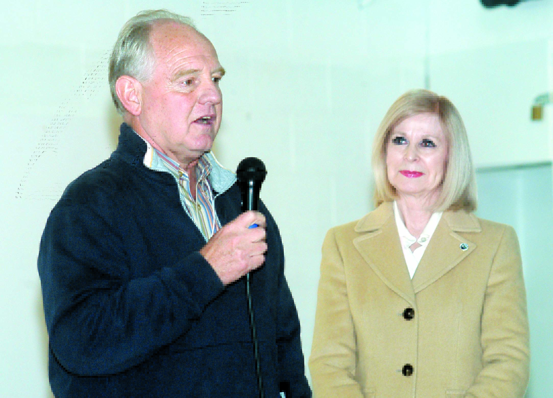 Paul Cronauer speaks after receiving honors from Port Angeles Mayor Cherie Kidd