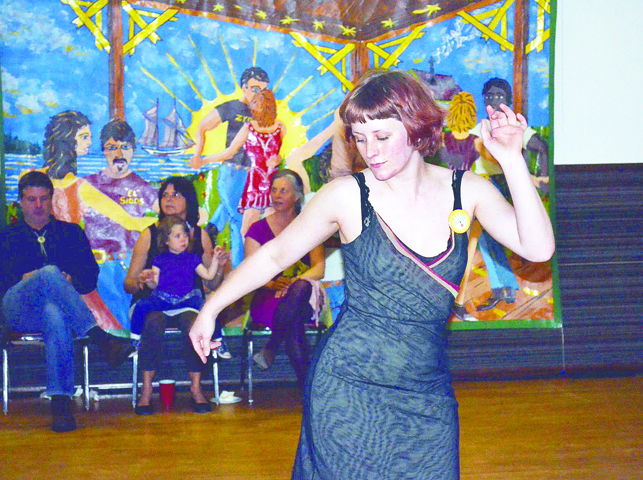 Bethany Patten demonstrates some of the moves that won her first place in the free form dance contest at KPTZ's first birthday party on Saturday night. Charlie Bermant/Peninsula Daily News