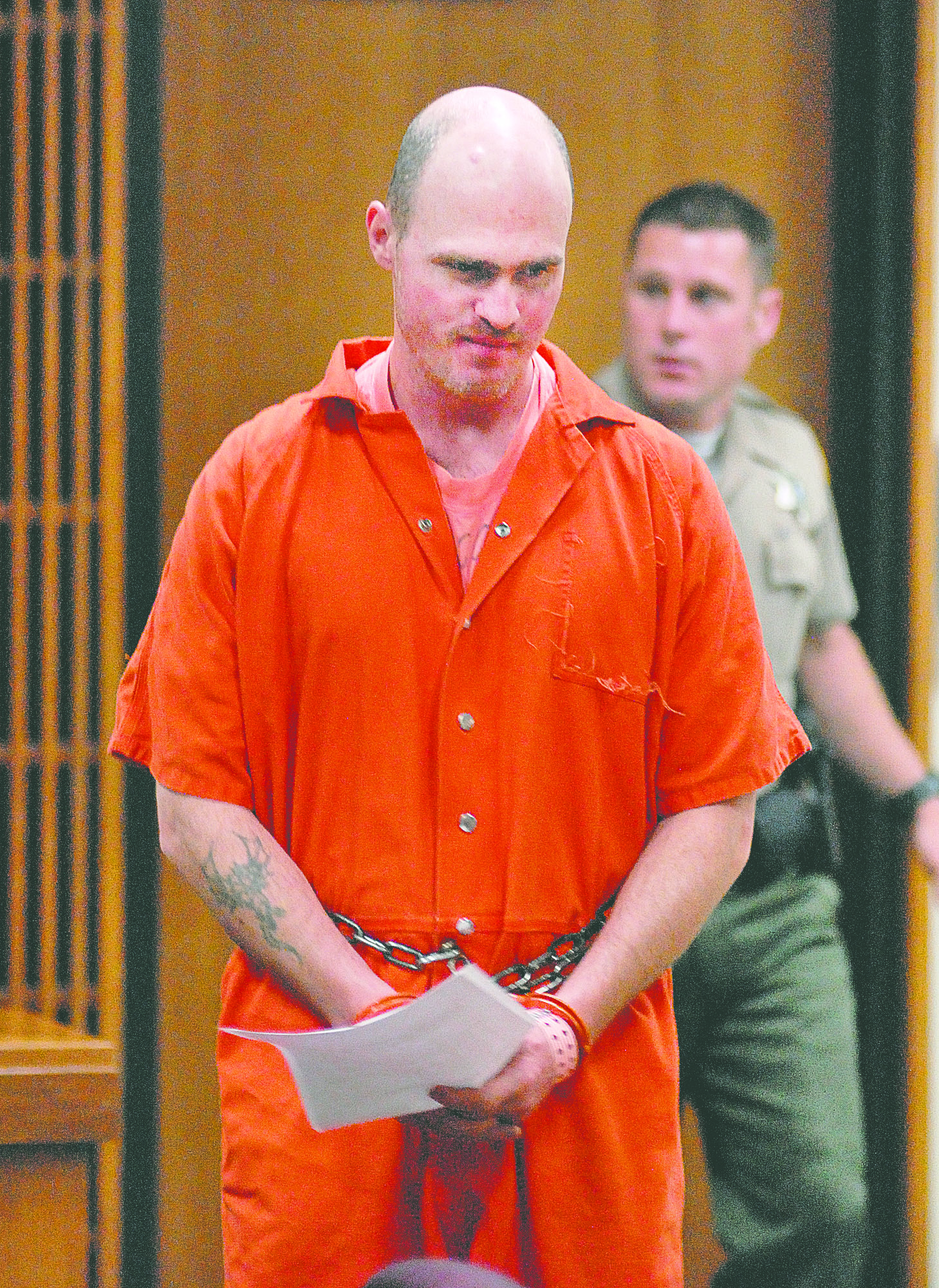 Patrick B. Drum enters the courtroom for his first appearance in Port Angeles on Monday. He is being held in jail without bail. Chris Tucker/Peninsula Daily News