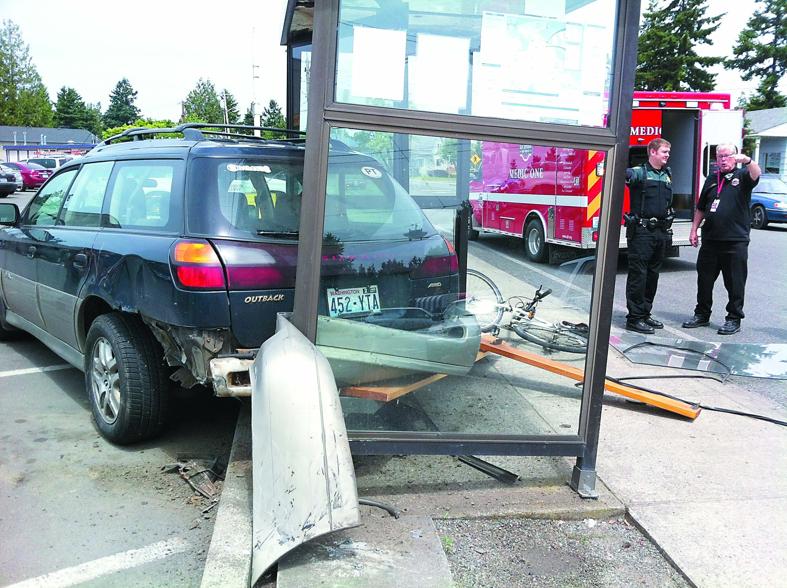 One person was taken to a hospital after a car was pushed into a Jefferson Transit bus stop in Port Hadlock on Thursday. Crystal Craig/East Jefferson County Fire-Rescue