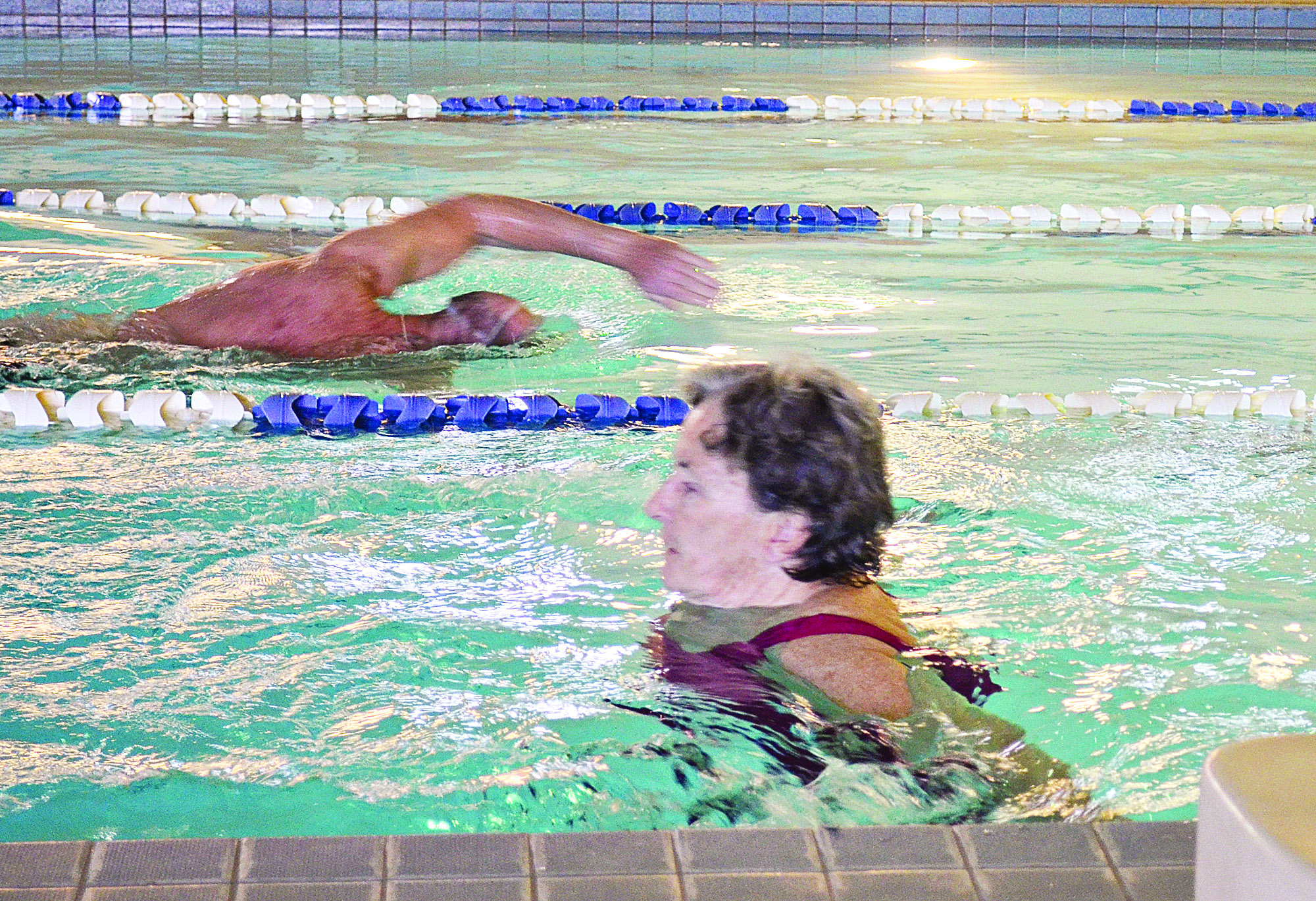 Eileen Wright of Port Townsend takes an early swim in the Port Townsend Municipal Pool this week. The pool will be closed for a total of six months in 2012 for maintenance and major repairs.  -- Photo by Charlie Bermant/Peninsula Daily News
