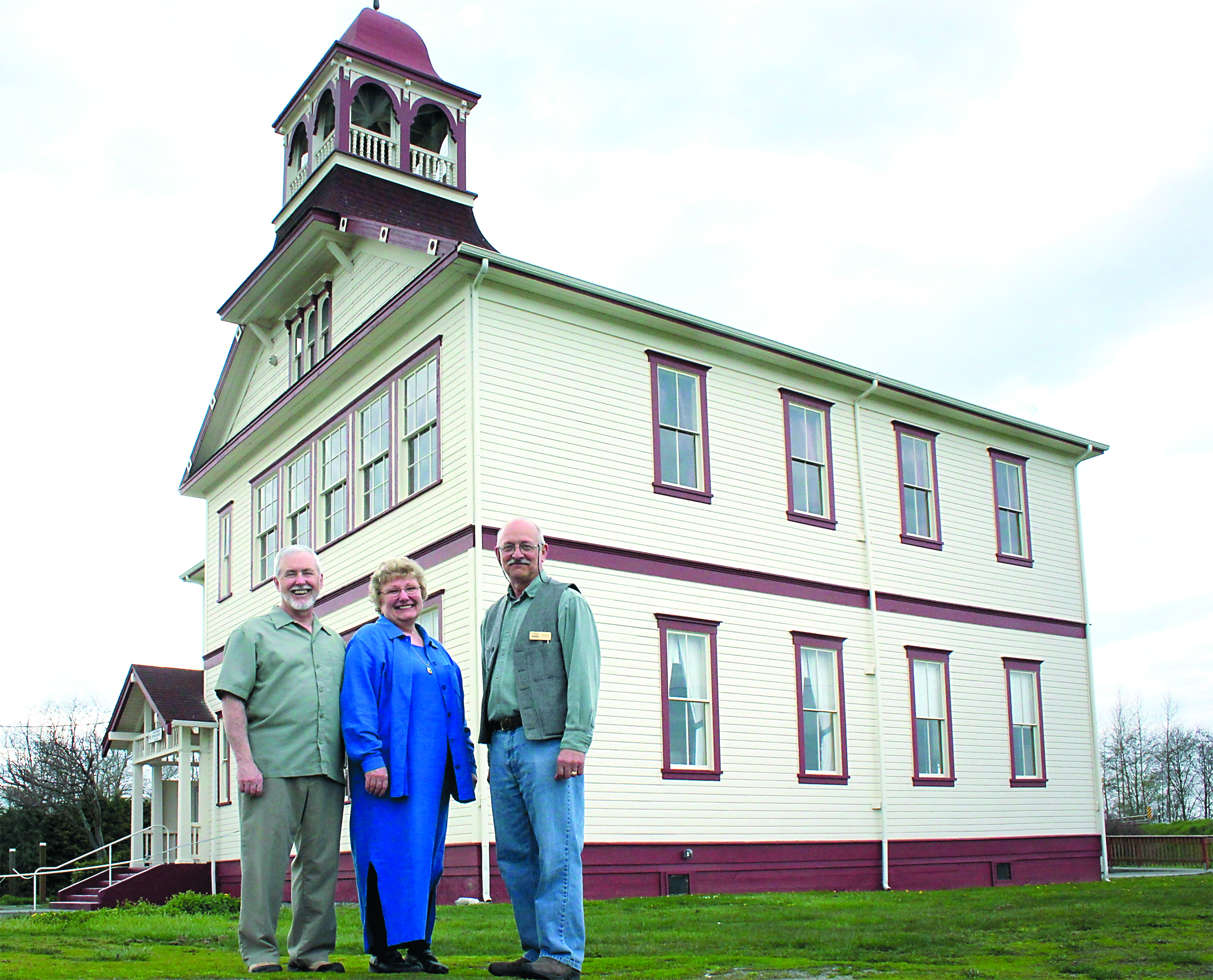 Dungeness Schoolhouse managers Mike and Kathy Bare and MAC Executive Director DJ Bassett