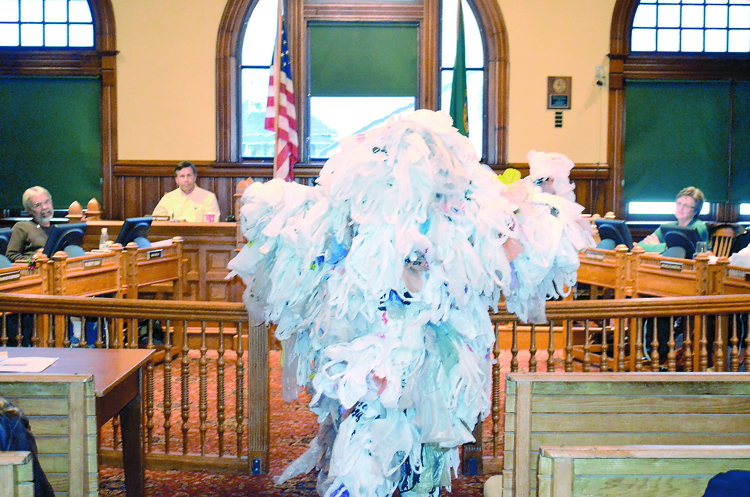 Jude Rubin as the Bag Monster addresses the Port Townsend City Council on Monday night. Charlie Bermant/Peninsula Daily News