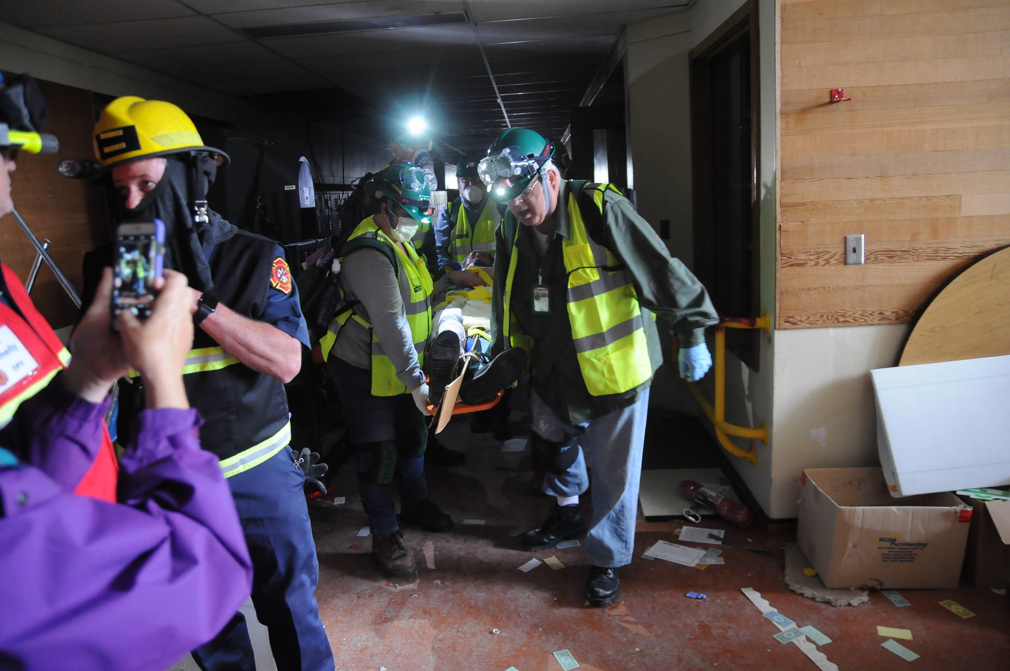 CERT members search the west end of the Sequim Community School for earthquake survivors during a June 3 drill. (Michael Dashiell/Olympic Peninsula News Group)