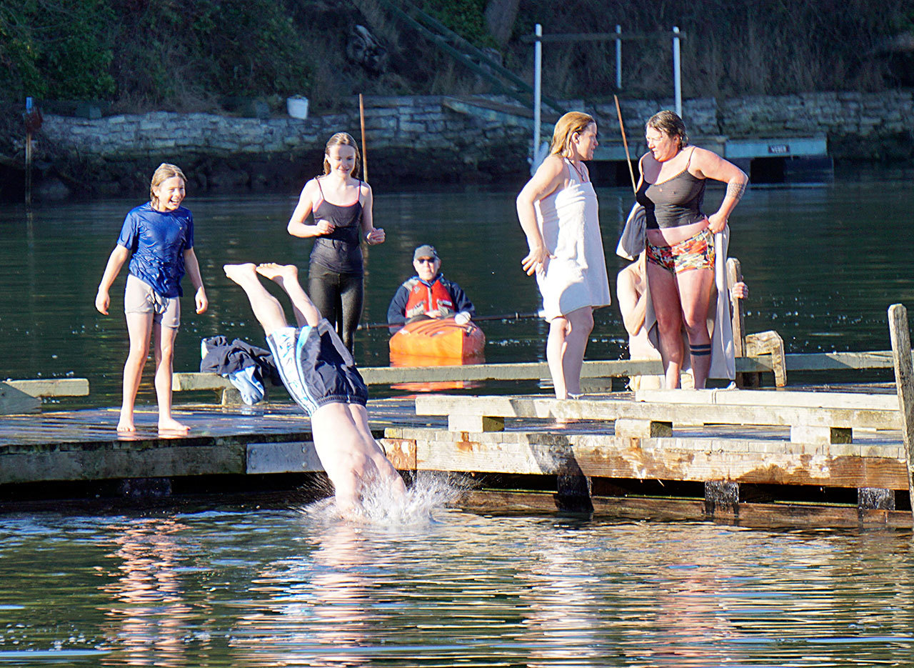 The 2016 Marrowstone Island polar bear plunge drew 87 people. (Peninsula Daily News)