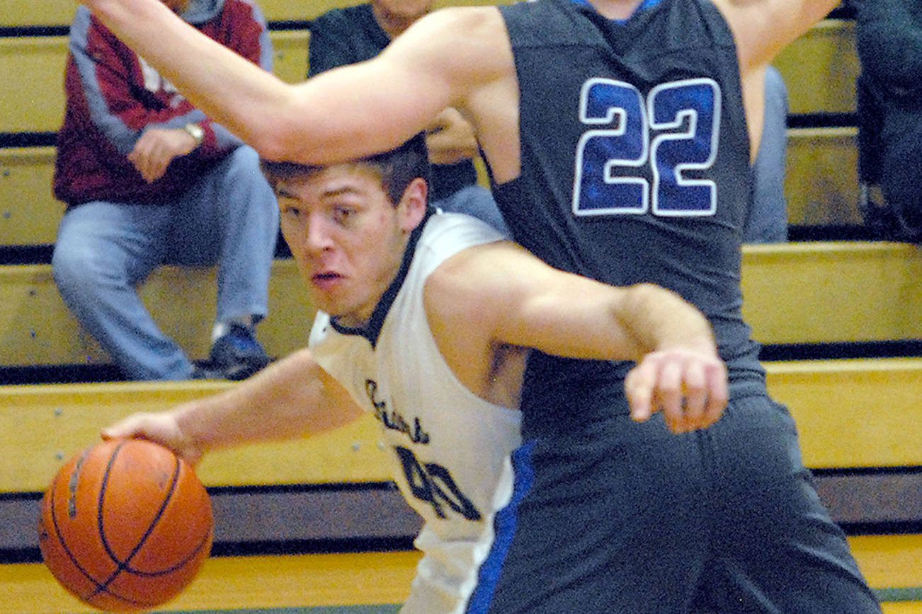 BOYS BASKETBALL: Port Angeles is money down the stretch in win over Olympic