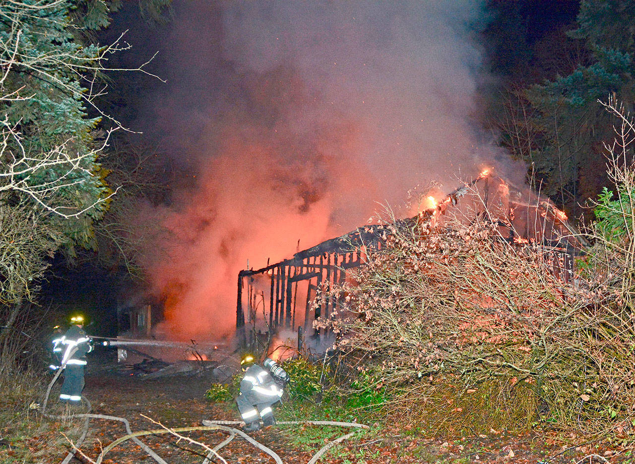 No injuries were reported in a Sunday night fire in the 1700 block of U.S. Highway 101 at Airport Road in Port Angeles. (Jay Cline/Clallam Fire District No. 2)