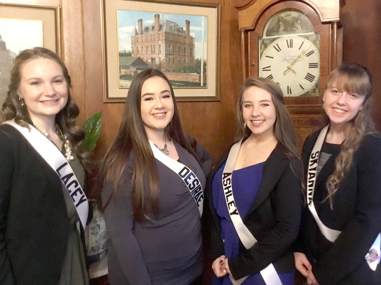 Donning their sashes for the first time are 2018 Rhododendron Festival royalty candidates Lacey Bishop, Desirae Kudronowicz, Ashley Rosser and Skyanna Iardella. (Jeannie McMacken/for Peninsula Daily News)