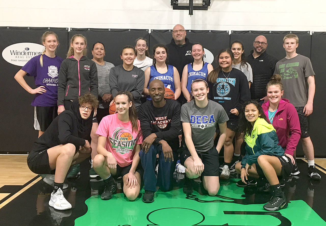 Jimmy Anderson of Olympias Anderson Athletics conducted 12 training sessions at The Warehouse Training Court this weekend working with more than 70 athletes from the Olympic Peninsula. Athletes and coaches pictured are: Gracie Long, Emilia Long, Madison Cooke, Neah Bay assistant coach Laurie McCaulley, Hannah Reetz, Gina McCaulley, Abby Schroeder, Jimmy Anderson, Savannah Huntingford, coach Mike Knowles, Katie Clark, Jaida Wood, Jazzlynn Yallup, Mia McNair, Camille Stensgard, Chimacum head coach Trevor Huntingford, Myra Walker and Brady Nickerson.                                (Joe Marvelle photo )