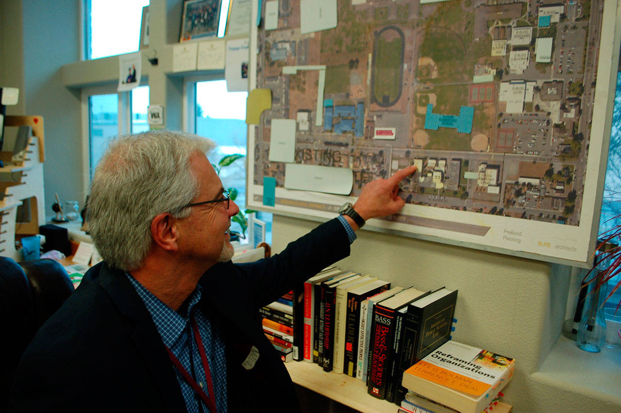 Sequim Schools Superintendent Gary Neal points out the northwest corner of the Sequim Community School where the district could move its central kitchen. Moving the central kitchen is one of many options the district is considering with possible changes to its long-term capital project plans. (Erin Hawkins/Olympic Peninsula News Group)