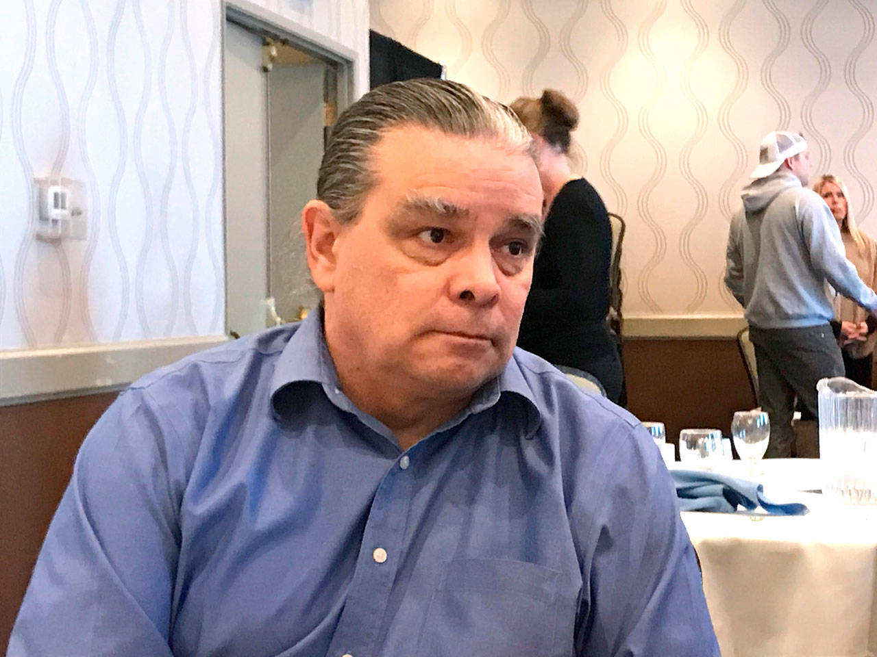 Employer defense lawyer James McCanna gave a presentation on new state minimum wage and sick leave laws Wednesday to business community members at a Port Angeles Regional Chamber of Commerce luncheon. (Paul Gottlieb/Peninsula Daily News)