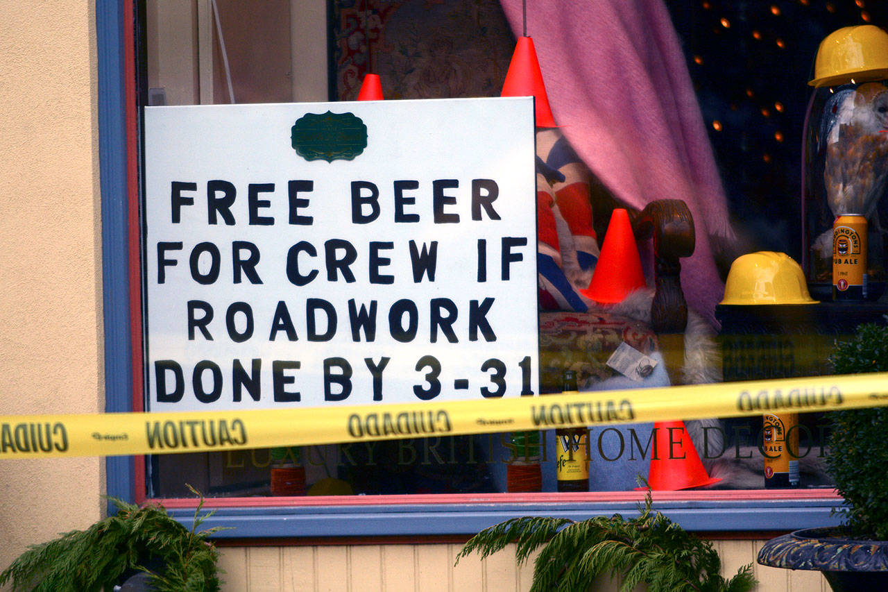 One downtown Port Townsend business owner is offering free beer for construction crews if they finish the Water Street construction by March 31. The project is scheduled to be finished in June. (Jesse Major/Peninsula Daily News)