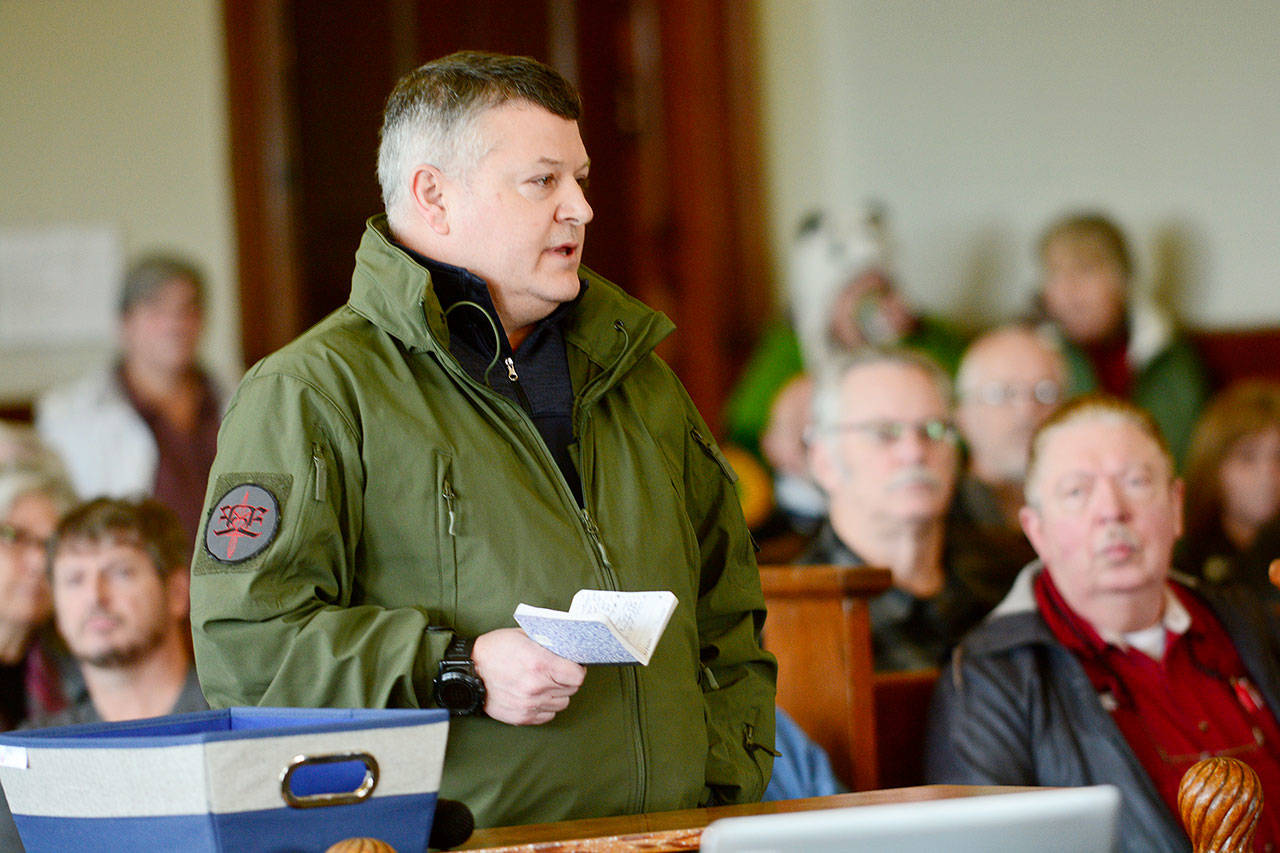 Joe D’Amico, who owns Fort Discovery and Northwest Security Services, tells Jefferson County commissioners on Tuesday that his pre-application for a conditional use permit vests his proposed shooting range near Tarboo Lake. (Jesse Major/Peninsula Daily News)