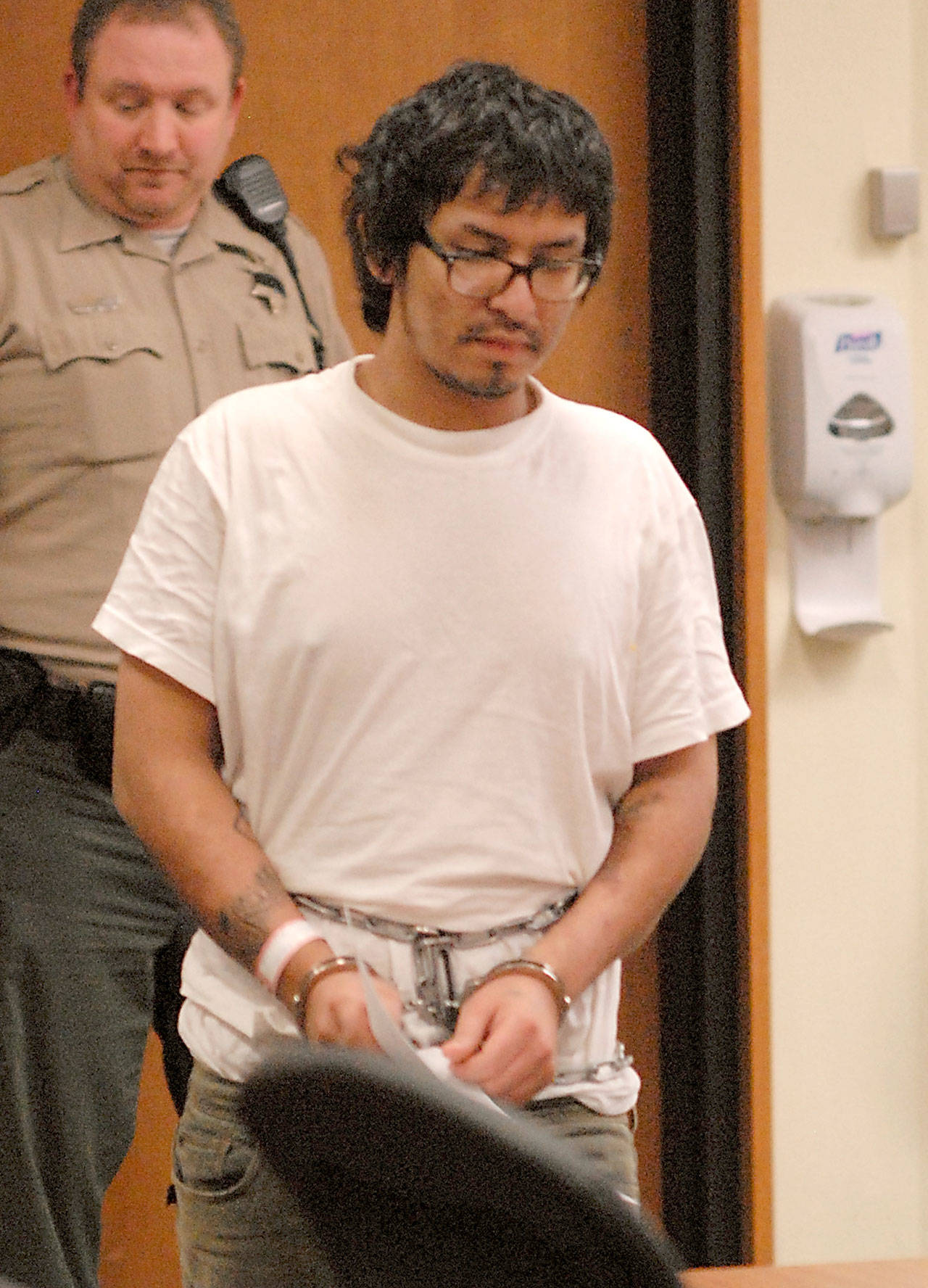 Alejandro Cendejas-Montoya makes his first appearance in Clallam County Superior Court in Port Angeles on Wednesday on charges related to his alleged assault on a corrections officer and escape from jail in Forks. (Keith Thorpe/Peninsula Daily News)