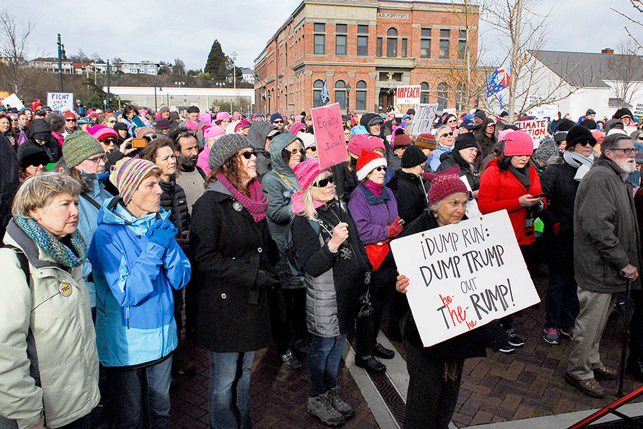 Marchers filling Pope Marine Park in Port Townsend listen to speeches during the 90-minute program. (Jeannie McMacken/for Peninsula Daily News)