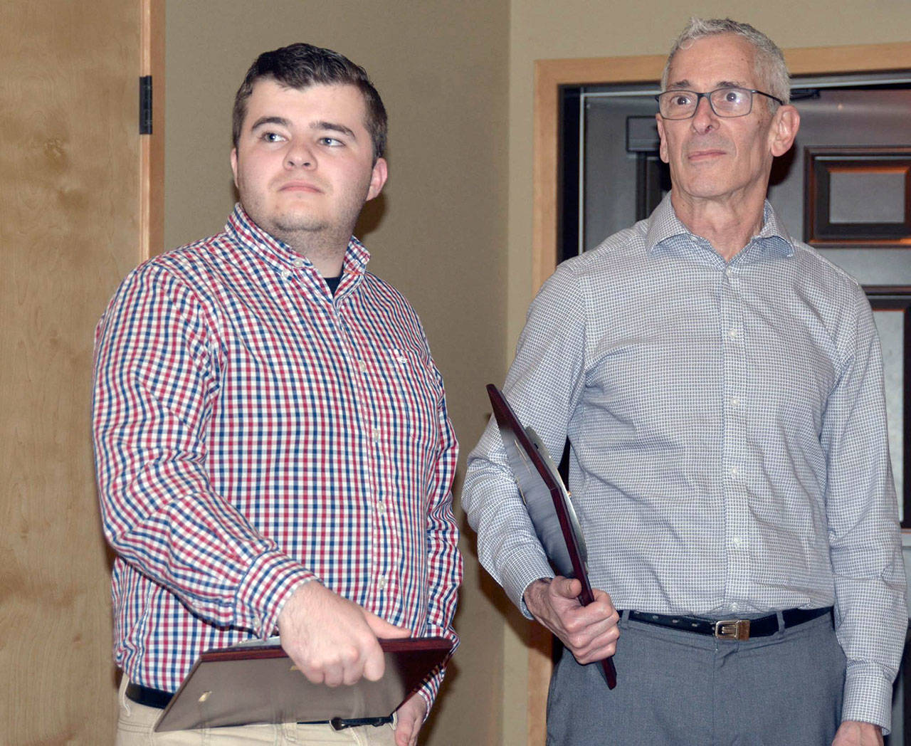 Peninsula Daily News reporters Jesse Major and Paul Gottlieb received awards at the Clallam County Fire District No. 2 annual awards ceremony. (Clallam Fire District No. 2)