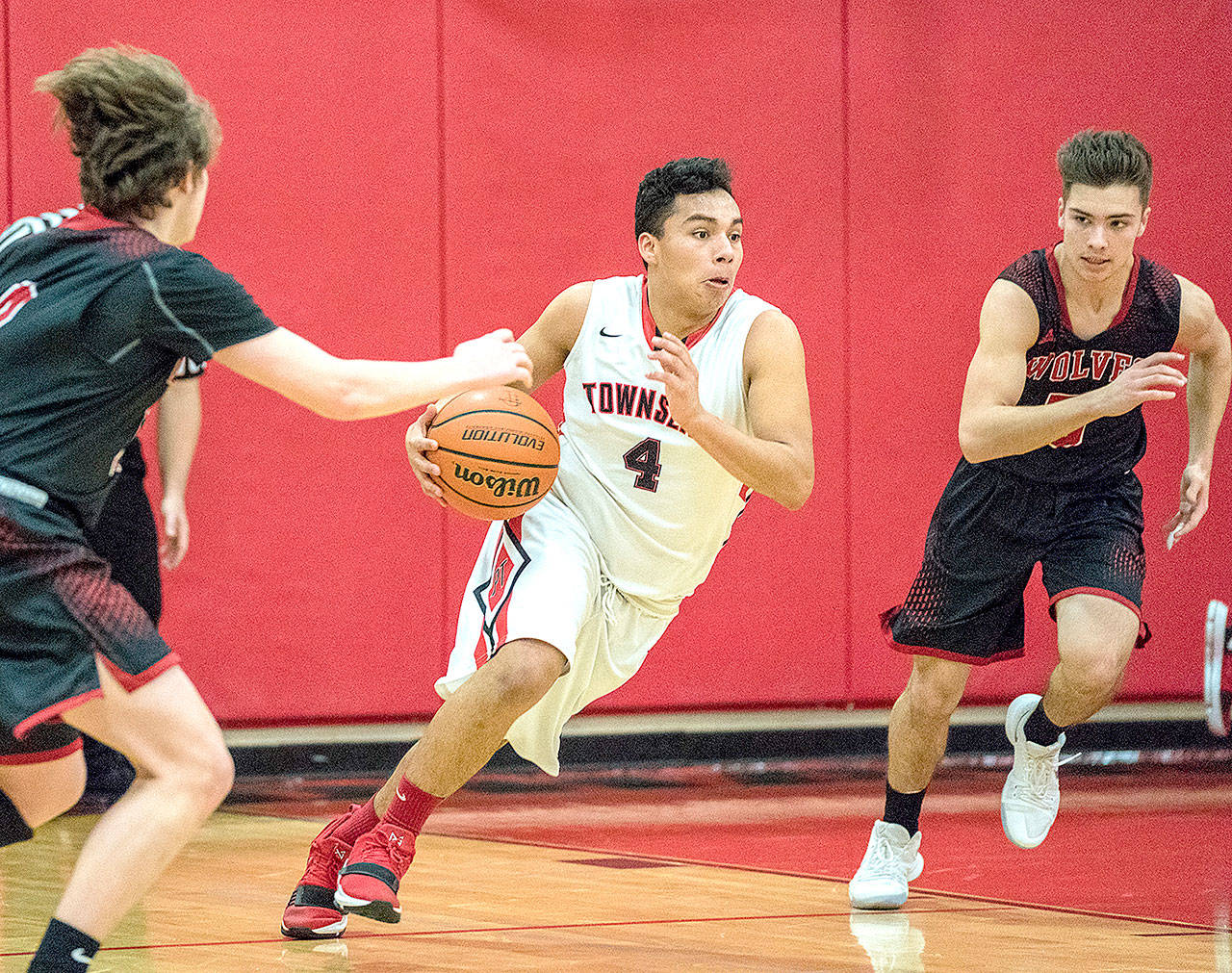 Port Townsends Jacob Boucher, 4, makes a dash for the basket during a game on Friday against the Coupeville Wolves at Port Townsend High School. (Steve Mullensky/for Peninsula Daily News)