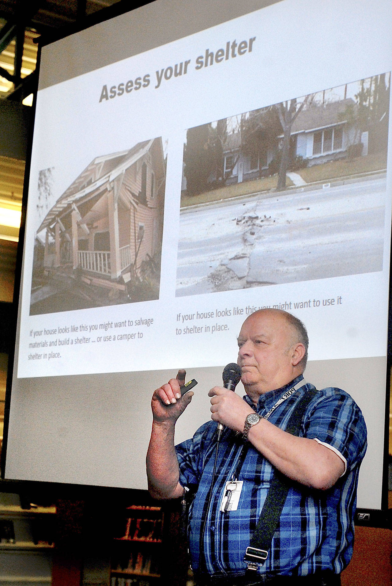 Earthquake-preparedness advocate and former state legislator Jim Buck of Joyce gives a presentation at the Port Angeles Public Library on Wednesday on how to prepare for a large Cascadia quake. (Keith Thorpe/Peninsula Daily News)