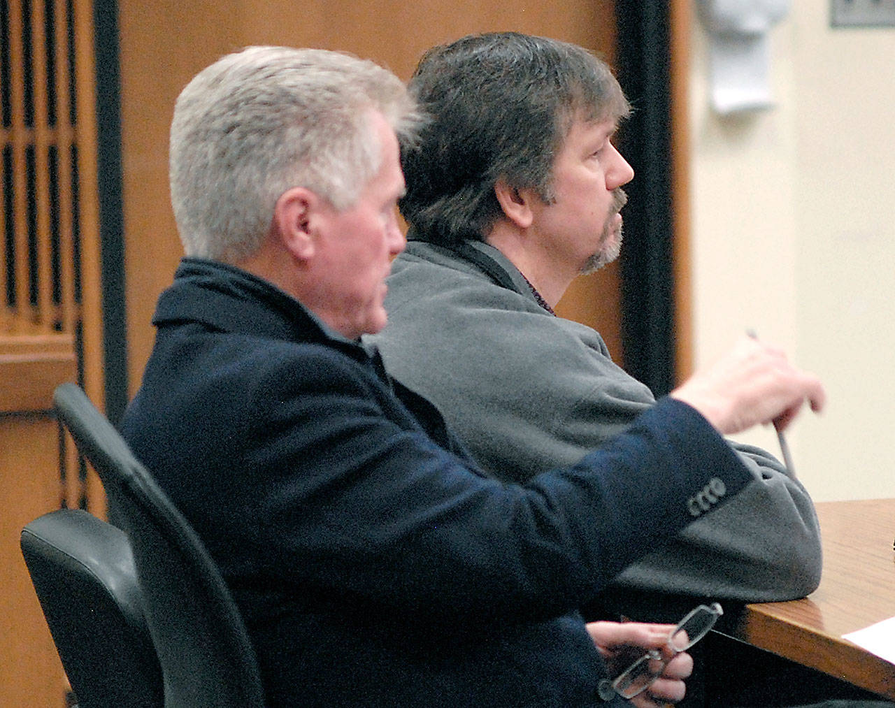 Vance Mattix, 50, of Joyce, right, sits with attorney Lane Wolfley during a change-of-plea hearing on charges of vehicular homicide Wednesday in Clallam County Superior Court in Port Angeles. (Keith Thorpe/Peninsula Daily News)