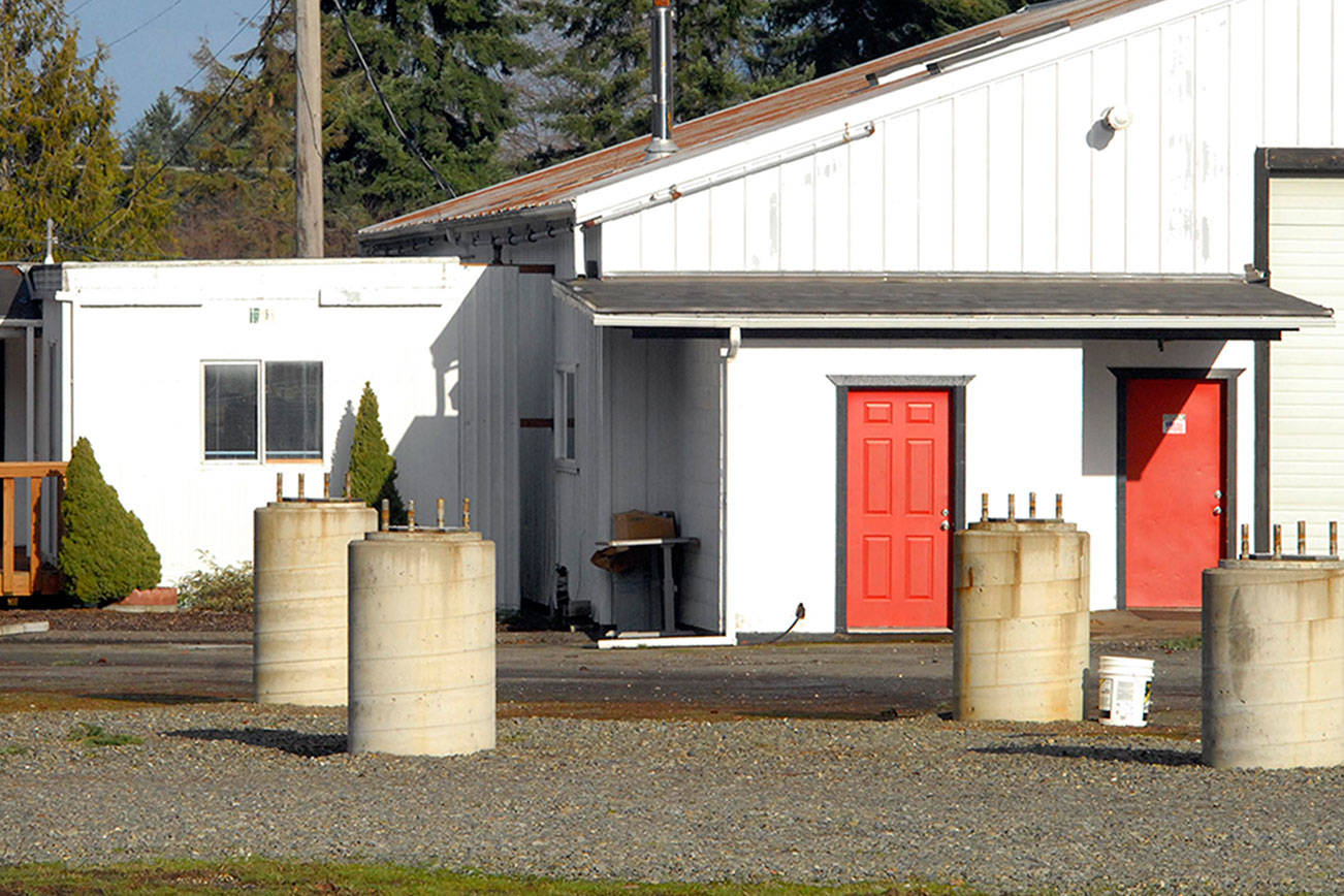 Keith Thorpe/Peninsula Daily News                                Concrete pilings that once supported a magnetic levitation demonstration track stand empty on Tuesday behind the vacated shops of Lev-X in the Port Angeles Business Park.