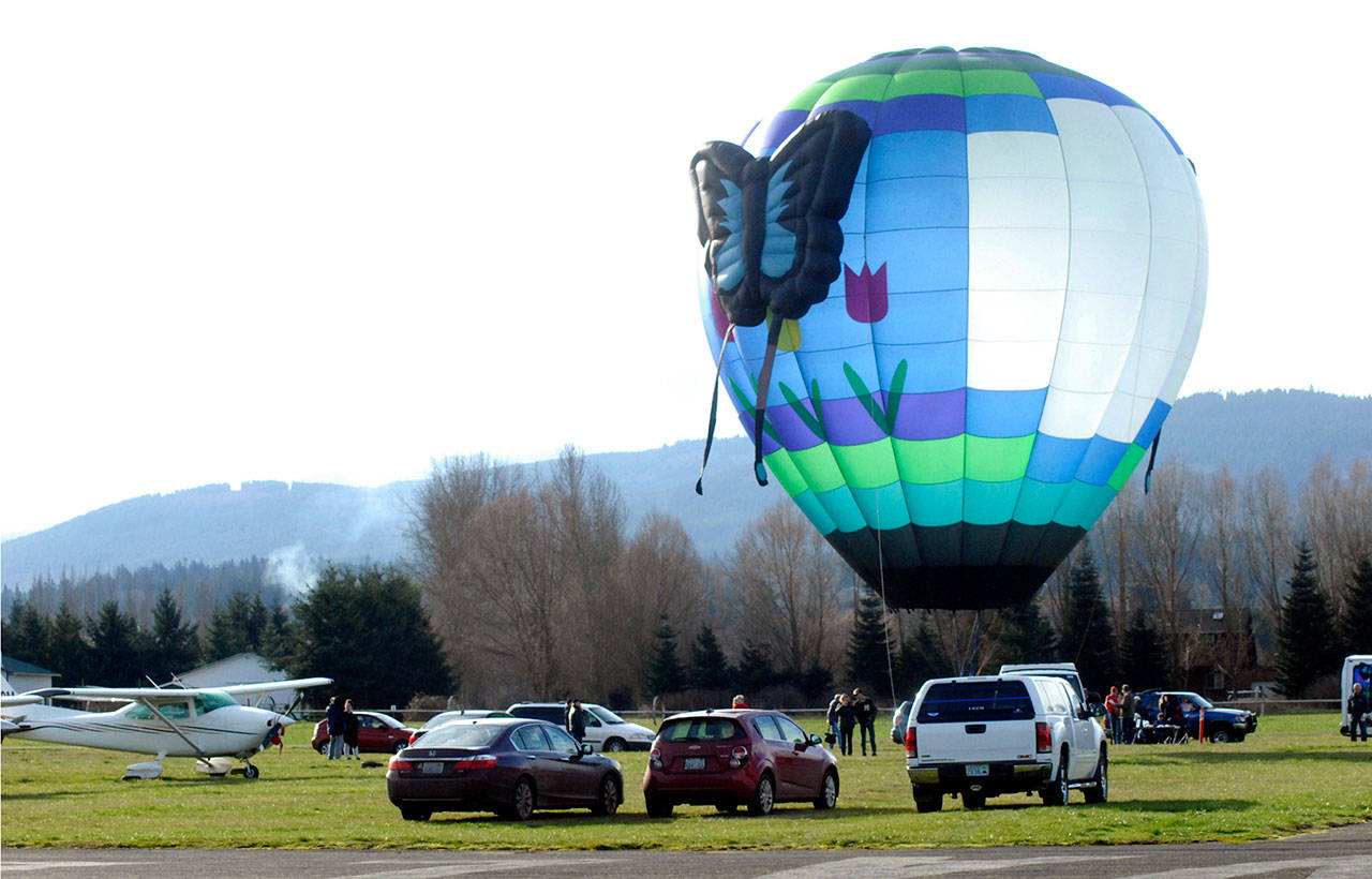 A Dream Catcher balloon stands near the runway at Sequim Valley Airport on Saturday. (Keith Thorpe/Peninsula Daily News)