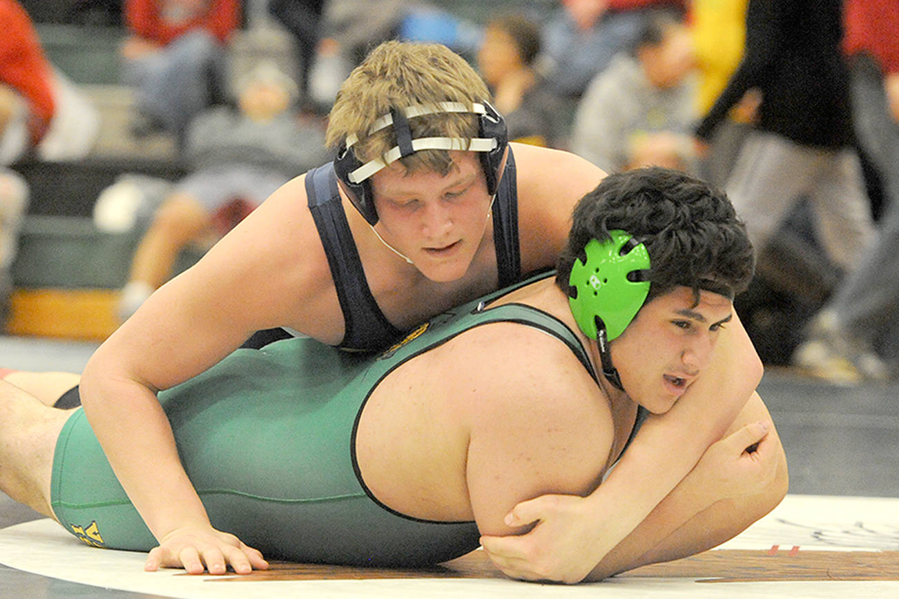STATE WRESTLING PREVIEW: 15-strong Forks boys team shooting for Mat Classic crown