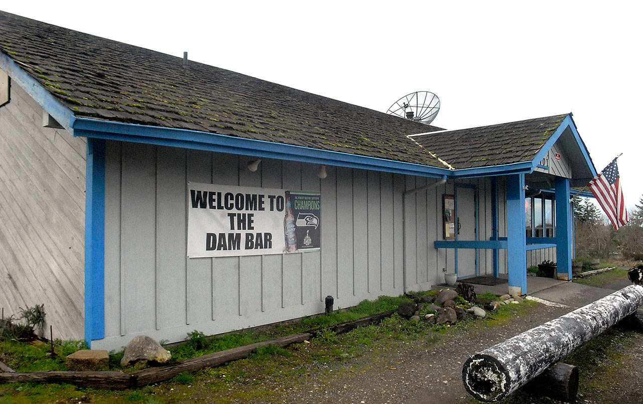 The Dam Bar, located near the junction of U.S. Highway 101 and state Highway 112 west of Port Angeles, is being sued by ASCAP for playing music without paying liscensing fees to the Nashville-based music royalty organization. (Keith Thorpe/Peninsula Daily News)
