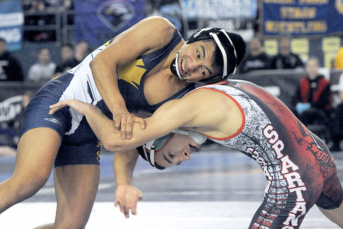 STATE WRESTLING: Forks’ Josue Lucas repeats as state champion; Sequim’s Kiara Pierson wrestles for 135-pound girls title tonight