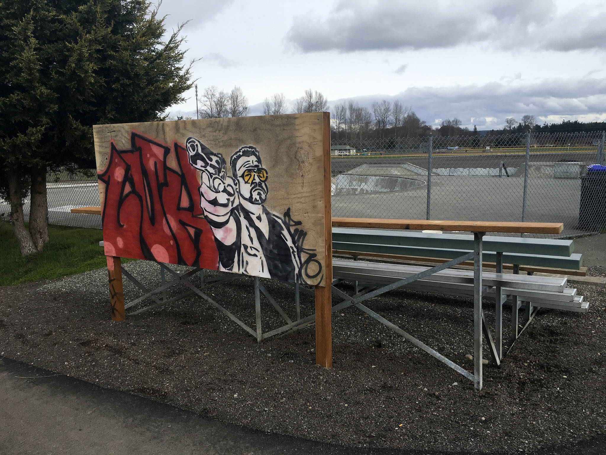 City of Sequim staff say a graffiti board at the Sequim Skate Park has deterred graffiti in the park since late 2012. However, a recent image depicting a gun has angered locals, leading city staff to enact a policy to paint over the board every two weeks. (Matthew Nash /Olympic Peninsula News Group)