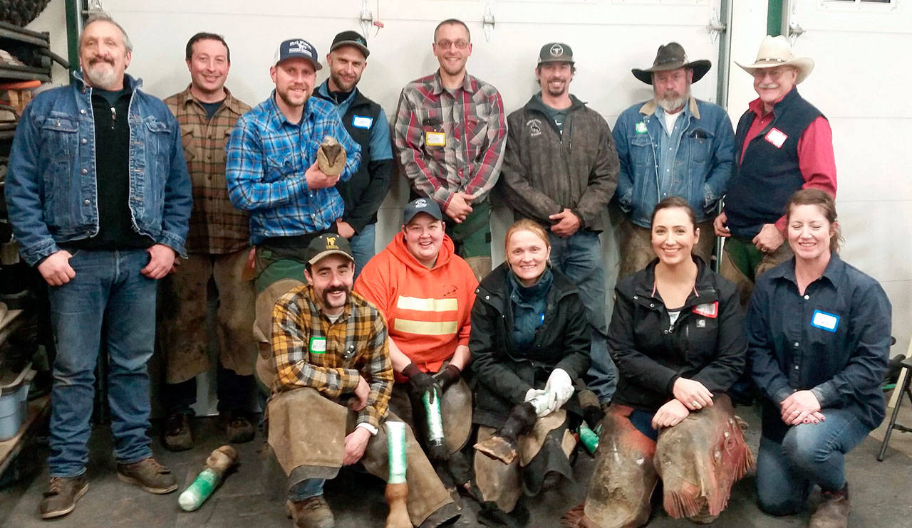 Chris Niclas recently hosted his second workshop for farriers and other equine practitioners based on the idea of professionals learning from each other in a safe, non-judgmental environment and for the benefit of horses and their owners. In the front row, from left, are: William Geoffroy, Becky Anderson, Polly McAllister, Crystal Hart and Marla Karabinos. In the back row, from left, are: Dave Hill, Preston Pherson, Mark Winston, Chris Niclas, Joe Marceau, Pat Pare, Jeff Doane and Glade Rankin. (Kristi Roe Niclas)