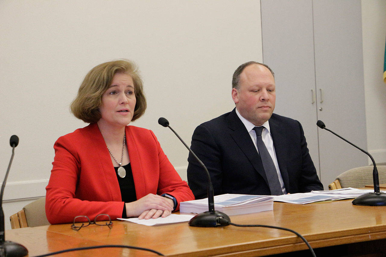Democratic Sens. Christine Rolfes and David Frockt speak to the media about a supplemental budget proposal in Olympia on Monday. (Rachel La Corte/The Associated Press)