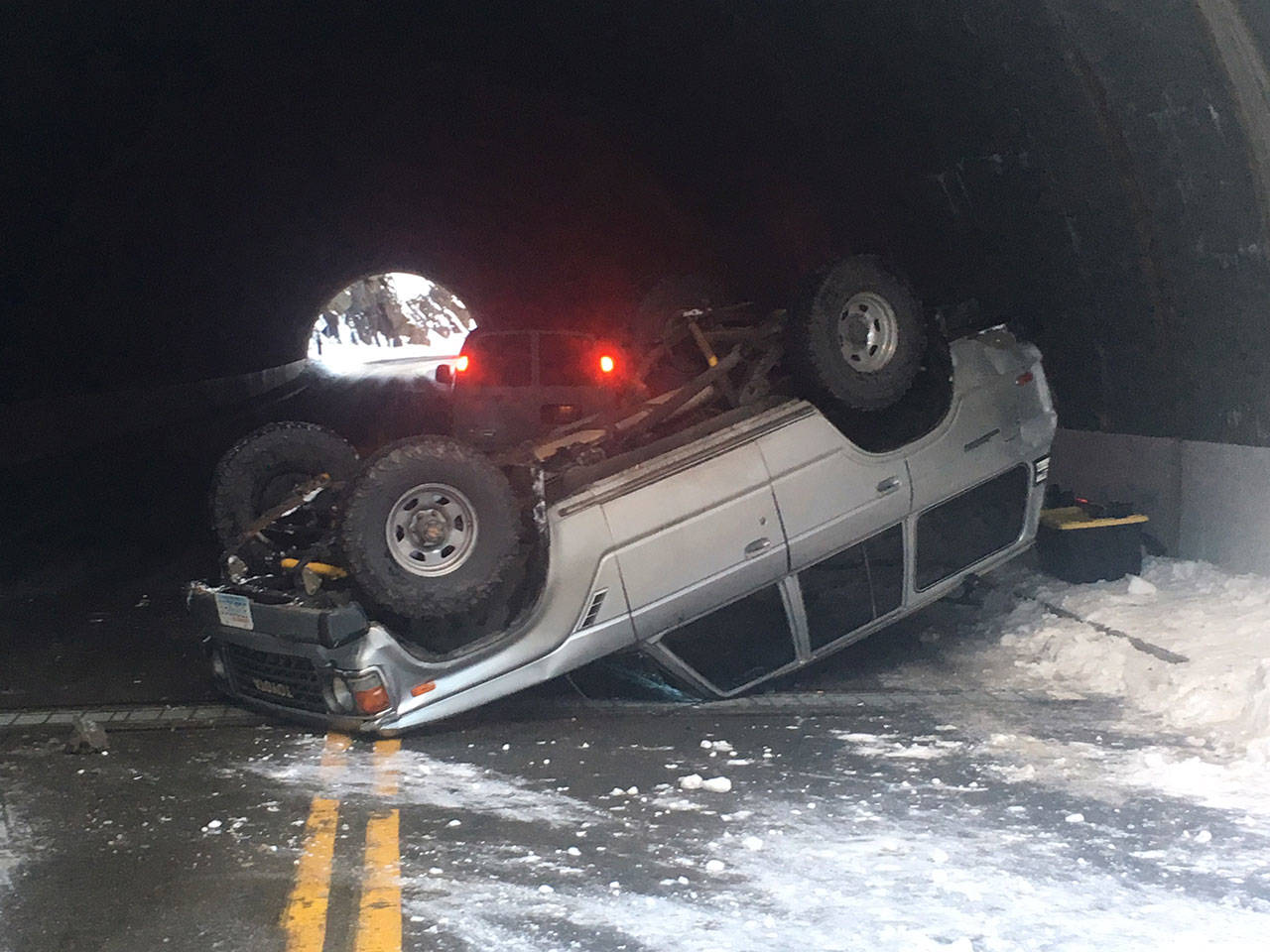 A 1985 Toyota Land Cruiser rolled onto its top Saturday while being driven down Hurricane Ridge Road toward Port Angeles. (Clallam Fire District No. 2)